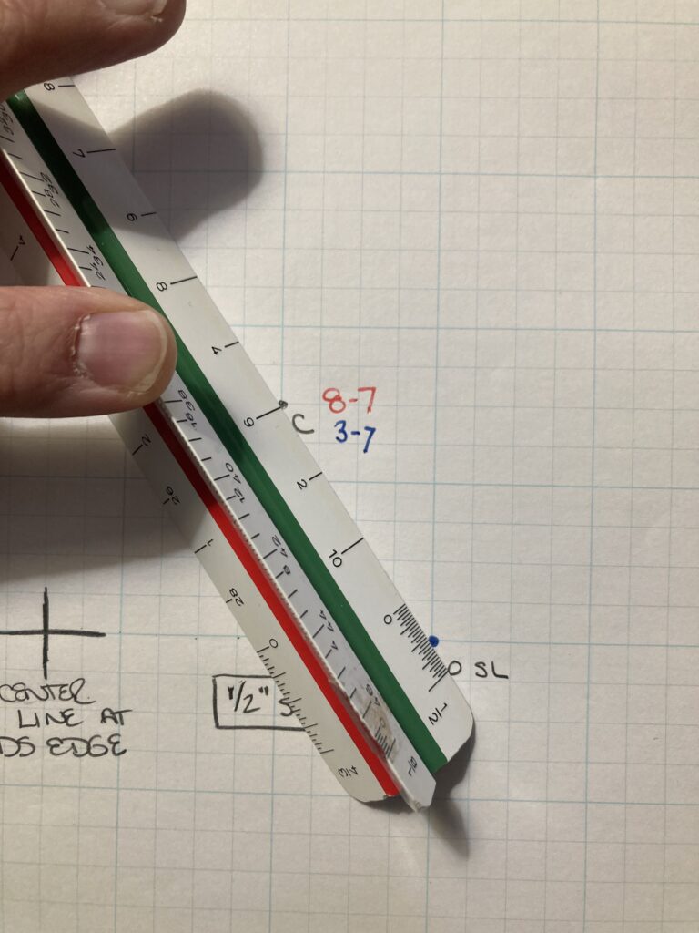 Using a scale rule to measure points